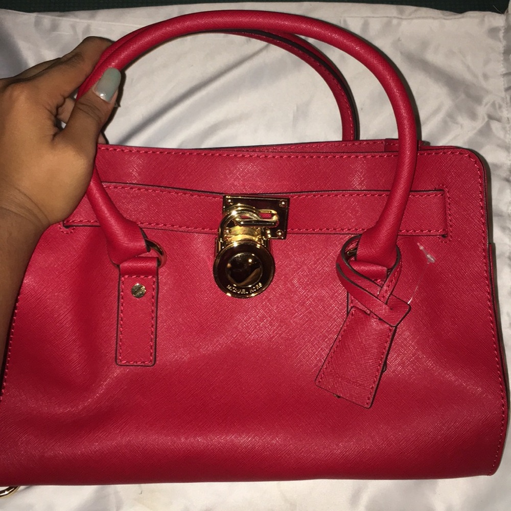 Red Michael Kors shoulder/hand bag